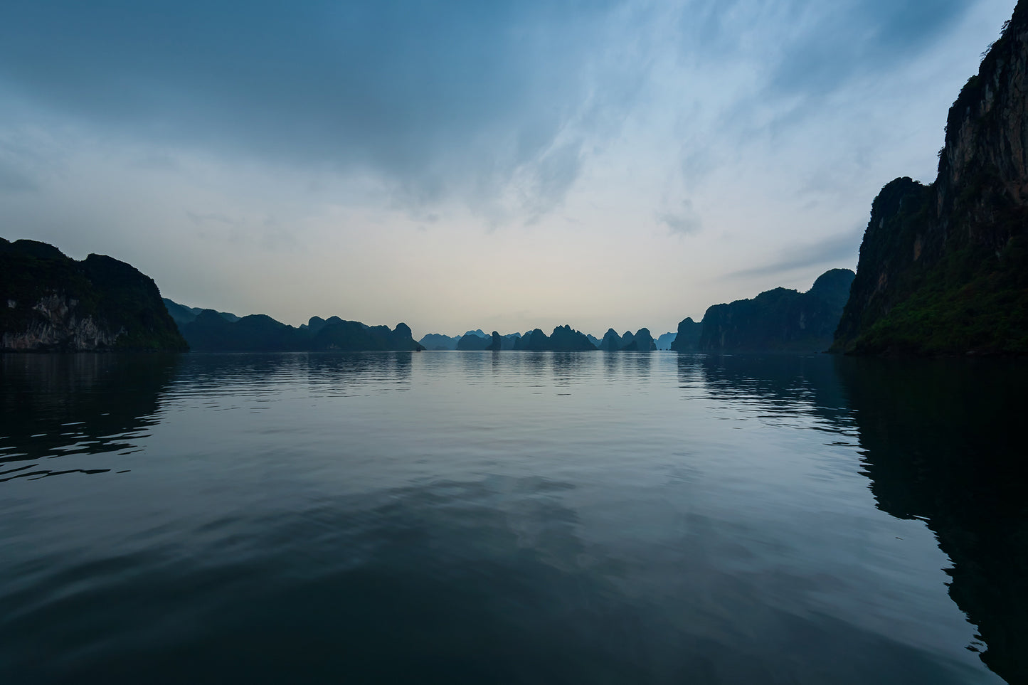 fine art landscape photo of serene halong bay  in shades of blue