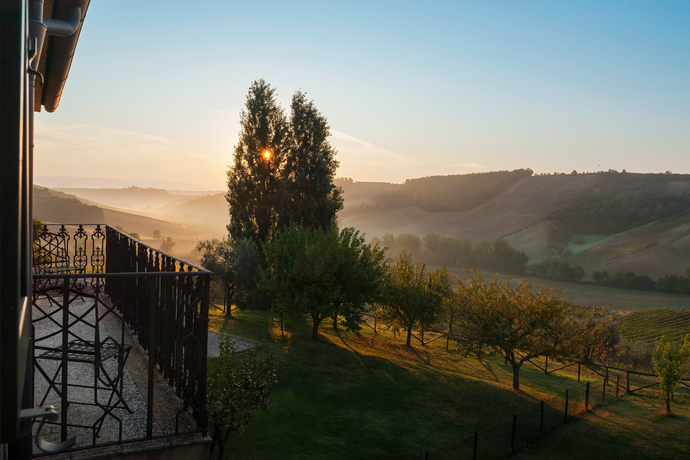 fine art landscape of countryside in tuscany at sunrise