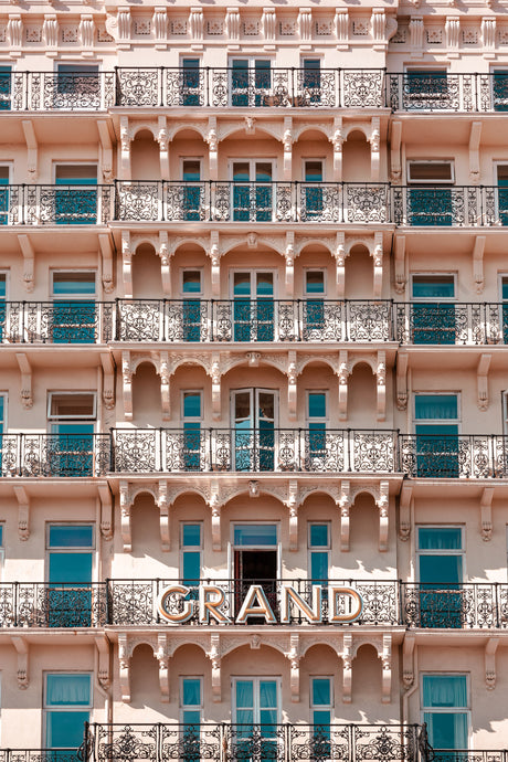 architectural image of tiered hotel facade in pink