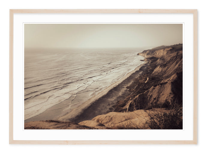 neutral tone fine art image of coastal california with cliffs and sea