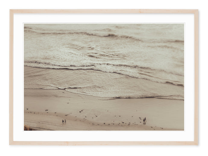 neutral tone fine art photo of beach landscape with rolling waves