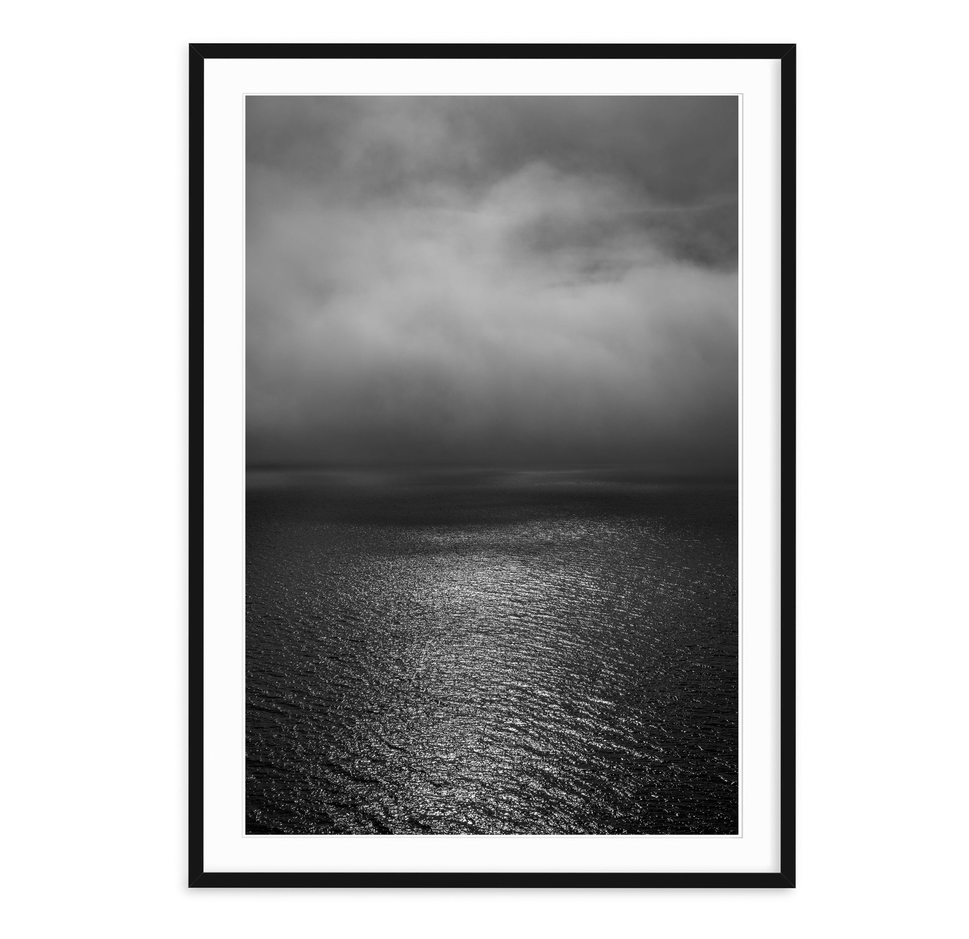 black and white landscape of sun through fog over loch ness in scotland