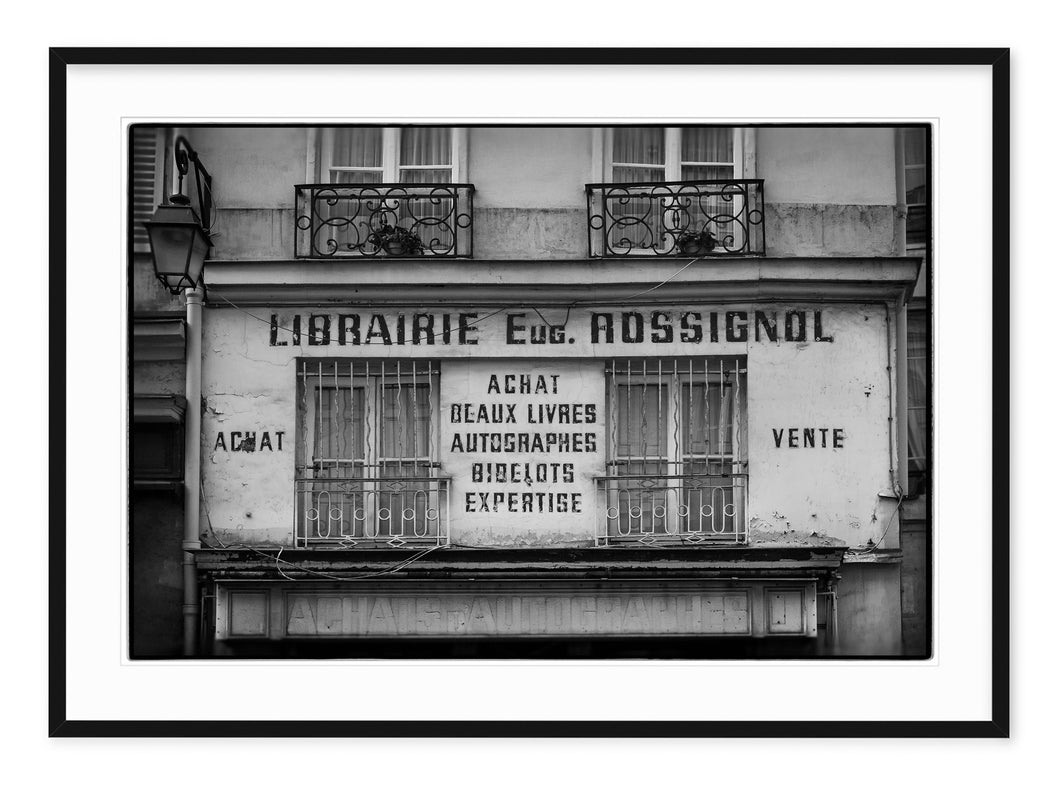 black & white travel photo of book shop in the latin quarter, paris