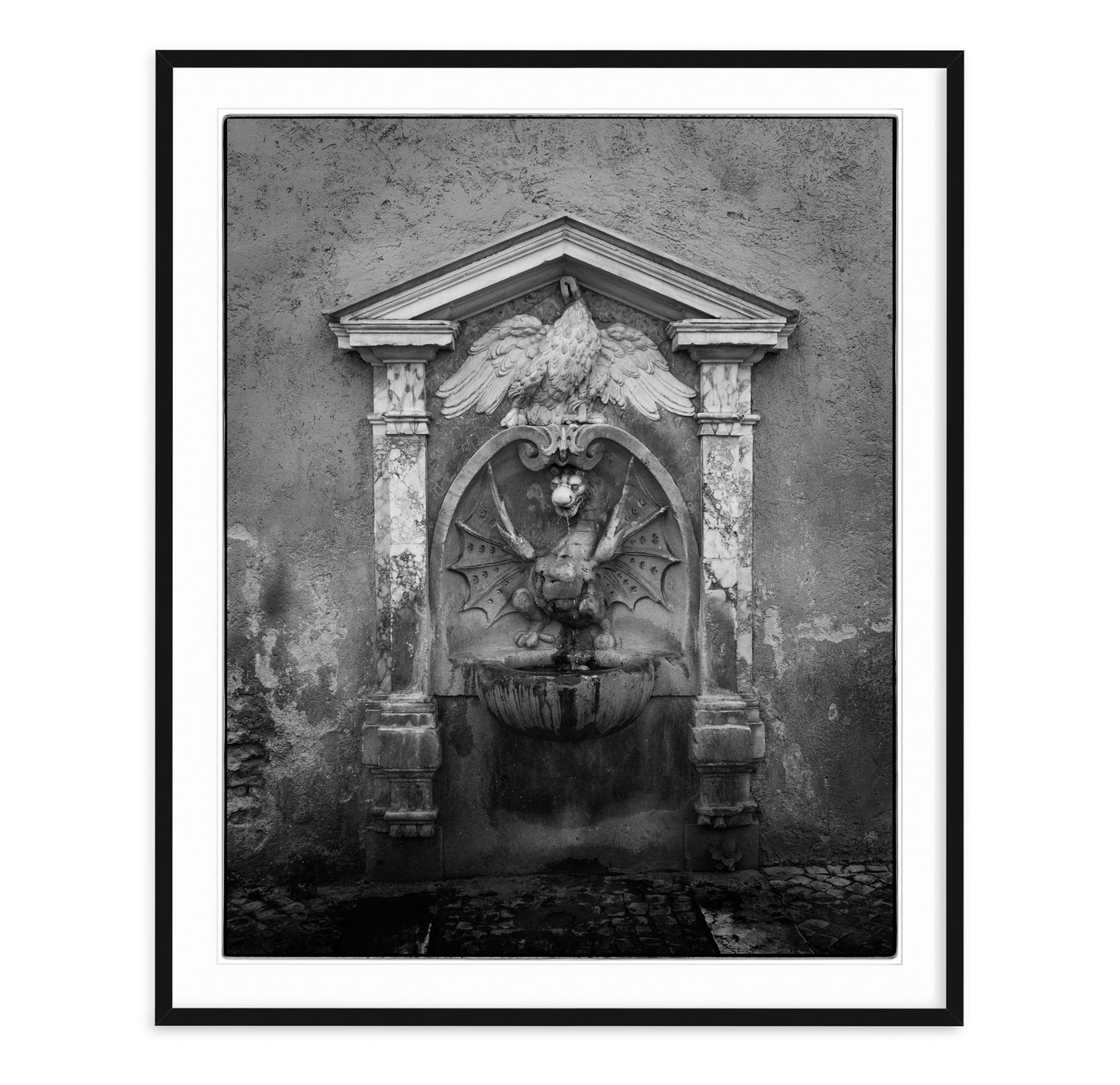 black and white fine art image of nasone fountain in rome italy with dragon and eagle