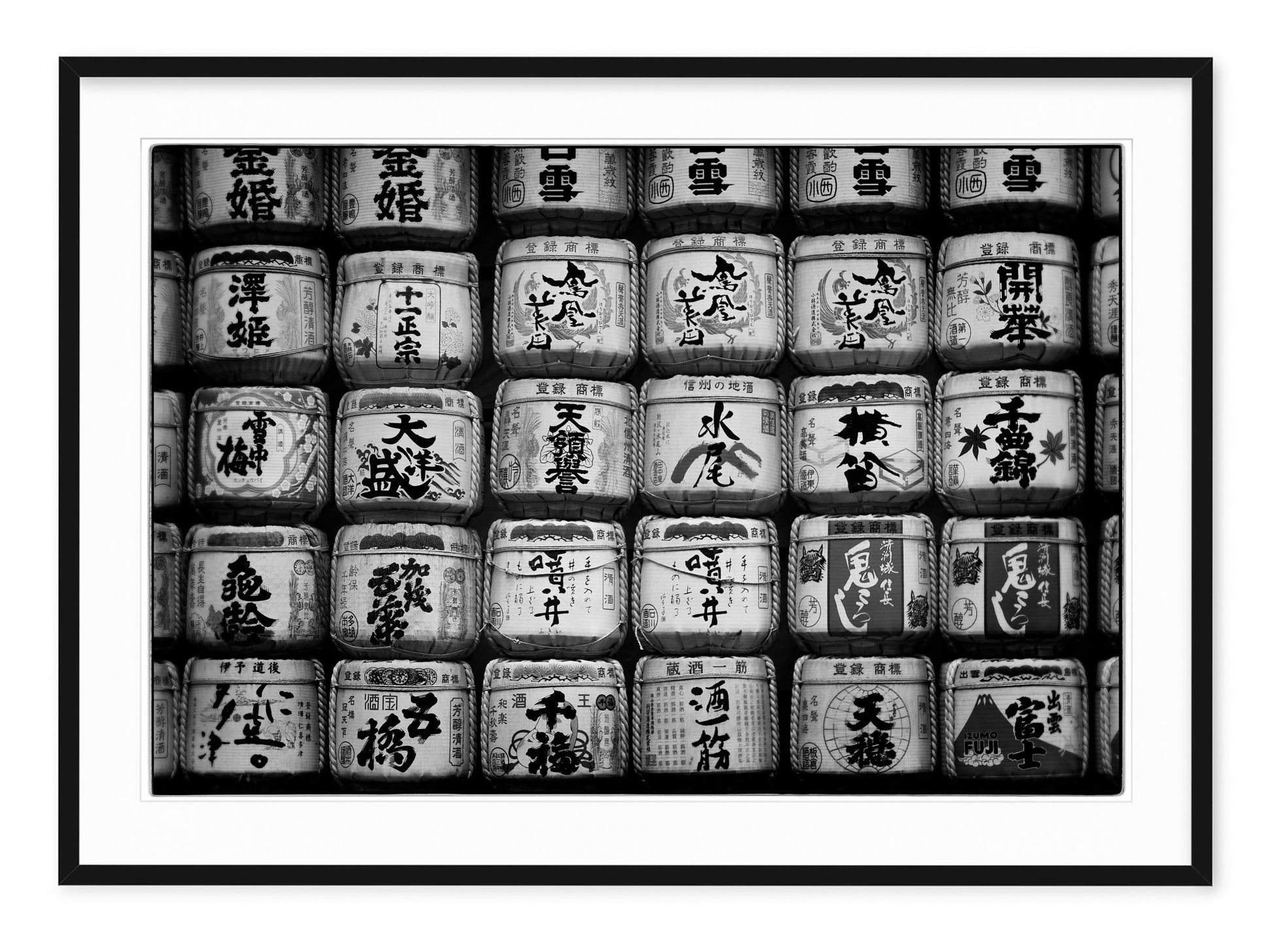 black and white fine art image of sake barrels in tokyo japan