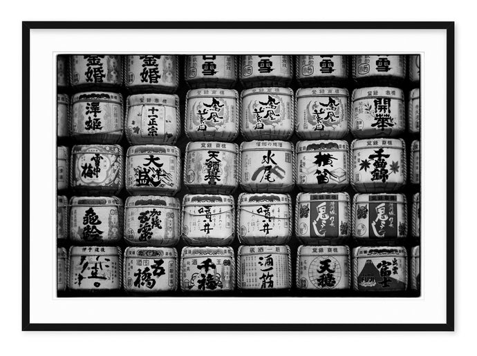 black and white fine art image of sake barrels in tokyo japan
